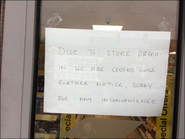 A note on the shop door informing customers the reason for the closure