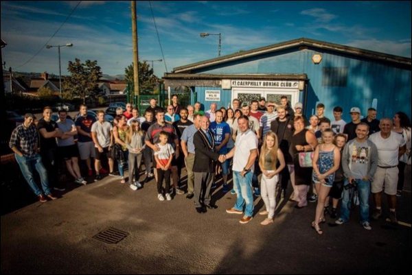 Deputy leader of CCBC, Cllr Mike Adams, cuts the ribbon at Caerphilly Boxing Club's opening