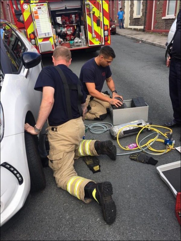 Caerphilly firefighters rescue a stuck kitten from a car in Trethomas