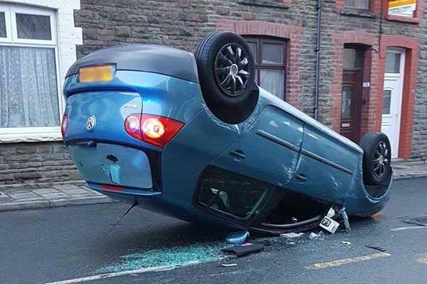 The overturned car after the crash in Senghenydd