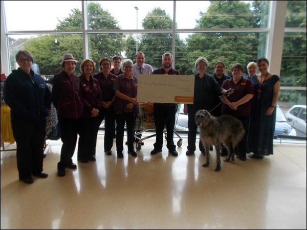 Staff at Sainsbury's Pontllanfraith present the Four Paws Animal Rescue charity with a cheque