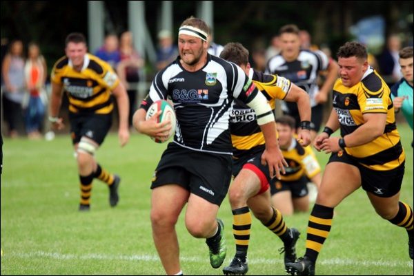 Bedwas No.8 Robson Blake leaves the Newport defence floundering on his way to the try line