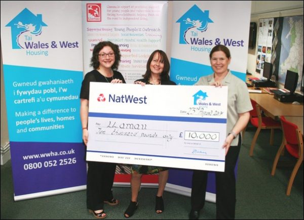 Sharon Lee, Chair of Wales and West Housing, left, with Chief Executive of Wales and West Housing Anne Hinchey, right; and Chief Executive of Llamau Frances Beecher, centre