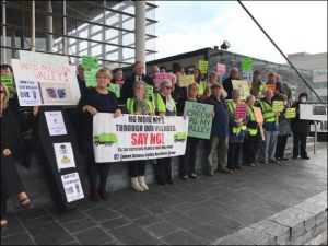 STANDING TOGETHER: Protesters made their opposition to a waste plant in Cwmfelinfach heard on the steps of the Senedd back in October