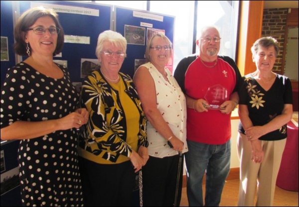 Fiona Wilkins, CCBC Public Sector Housing Manager, with Maesteg, Pentwynmawr residents, winners of the Best Sheltered Housing Communal Garden
