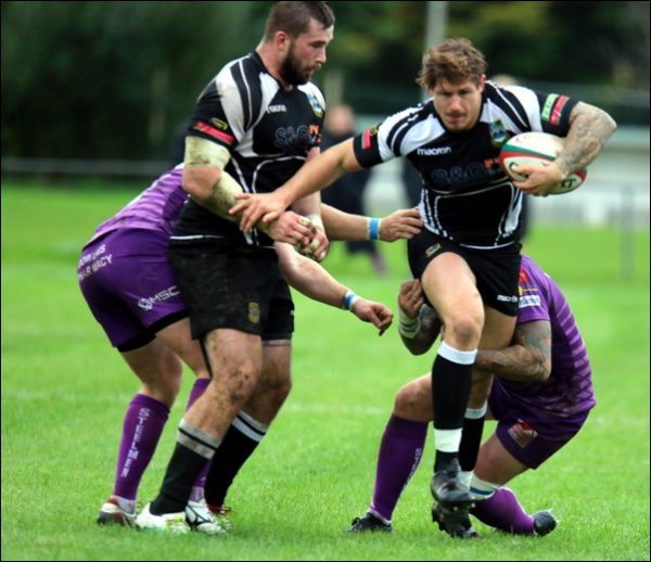 BREAK: Bedwas centre Ross Wardle carries past Ebbw defenders
