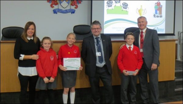 Pupils from St Helen's Primary School in Caerphily are recognised for their efforts in recycling batteries
