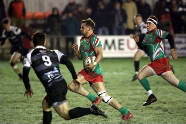 Bedwas' David McGuigan makes a break against Cross Keys