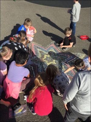 Tynewydd Primary School pupils created a giant star mural using 5p and 10p coins