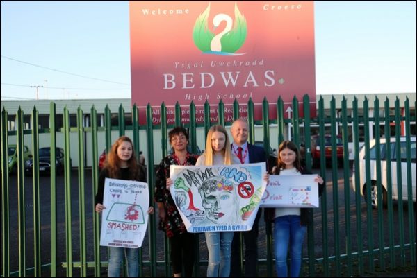 Winner Ellie Austen and runners up Tegan Fletcher & Tahlia Edwards with Cllr. Sean Morgan and the council's road safety projects officer Susan Davies