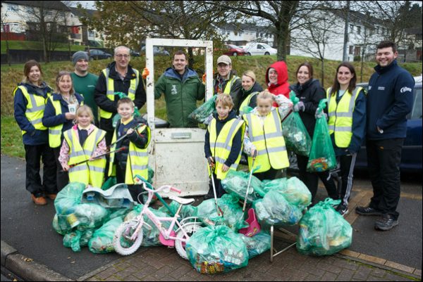 WORKING TOGETHER: Pupils from Fochriw Primary School lent a hand to clean up 20 tonnes of rubbish from nearby common-land 