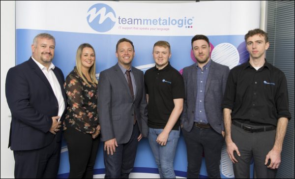 Mike Parfitt, centre-left, with some of the Team Metalogic staff