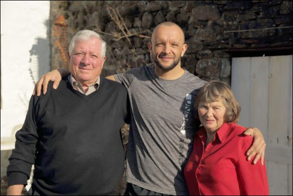 CARING: Jamie Baulch with his parents Marilyn and Alan