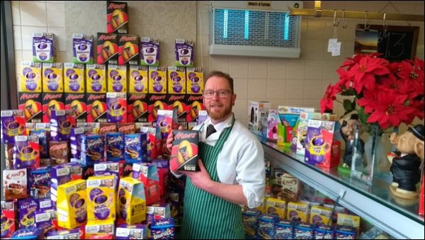 Chris Powell with the donated Easter eggs