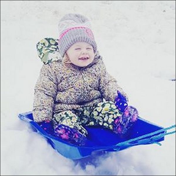 23-month-old Gracie Midgley enjoying the snow in Abertridwr