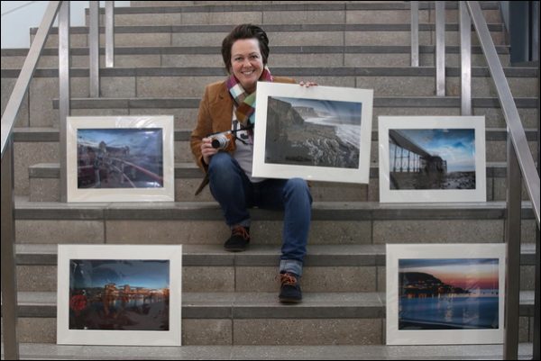 Photographer Johanna Skelding with some of her work
