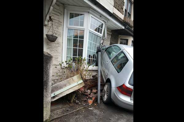 The car crashed into the living room at around 7pm on bank holiday Monday
