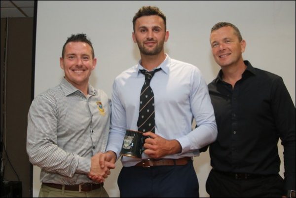 Bedwas RFC’s James Richards, centre, with backs coach Stefan Sankala, left, and Scrum V’s Sean Holley