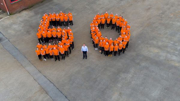 John Curwen, Managing Director at Eriez Europe, with just some of the company’s 130 staff
