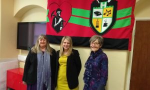 Minister for Housing and Local Government, Julie James AM, left, with Deputy Housing and Local Government Minister, Hannah Blythyn, and Caerphilly Miners Centre secretary Katherine Hughes, right