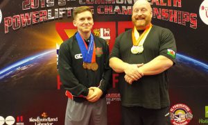 Geraint Davies, left, and dad Dylan at the Commonwealth Powerlifting Championships in Canada