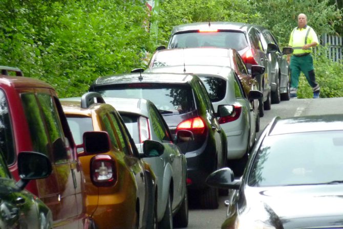 Cars queuing up outside Trehir Civic Amenity Site near Llanbradach