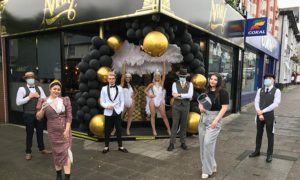 Aviary staff members at the cocktail bar's official opening in 2020