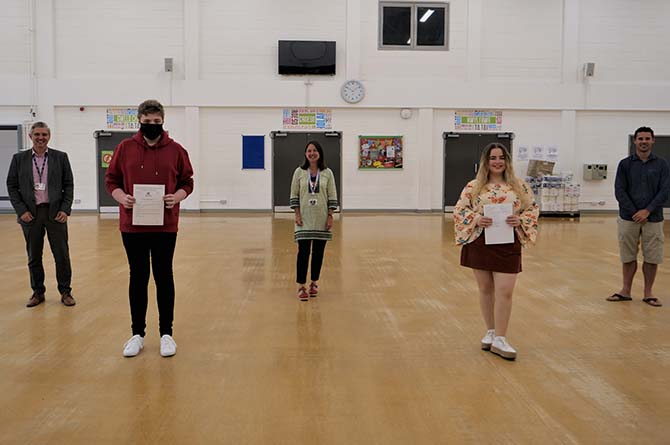 Ysgol Gyfun Cwm Rhymni pupils with the council's education director Richard Edmunds, left, Cllr Philippa Marsden, centre, and headteacher Matthew Webb