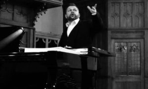 Tenor Lee David Bowen performing on stage