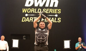 Gerwyn Price lifts the World Series of Darts trophy in Salzburg, Austria