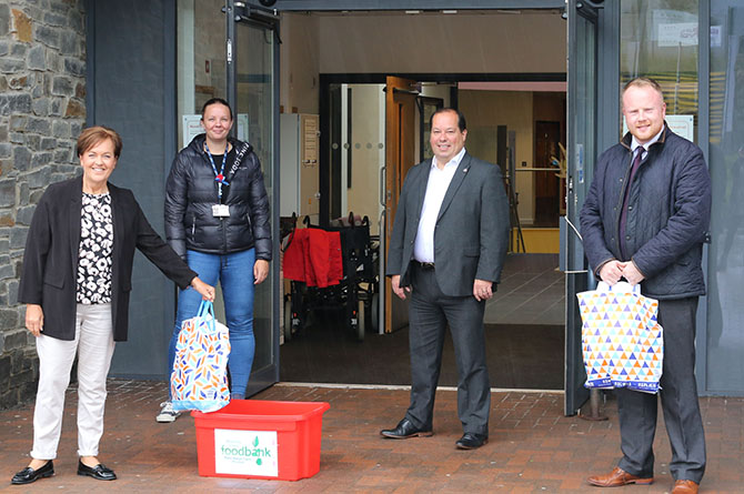 Dawn Bowden MS, Kirstie James of CCBC, Gerald Jones MP and Cllr Carl Cuss at the food collection point in Rhymney