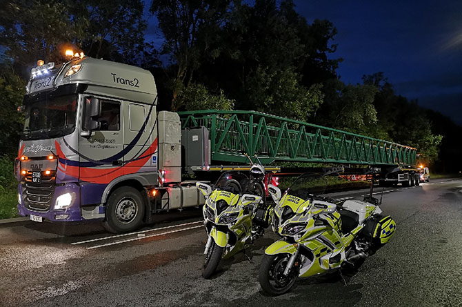 The Trecenydd footbridge being transported back after refurbishment
