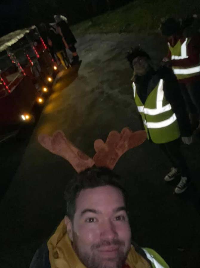 Volunteers with Father Christmas' sleigh in Llanbradach