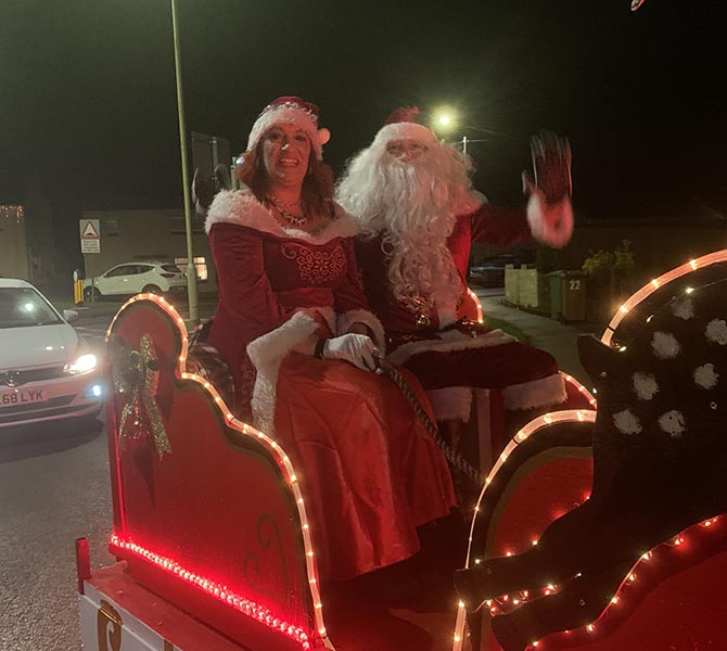 Father Christmas and Mother Christmas in Bedwas as part of Operation Santa BTM 2020