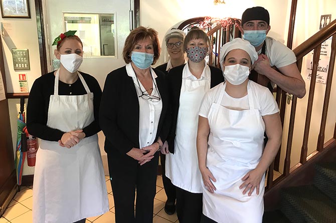 Lynne Evans with staff members at Glanmor's Tea Room