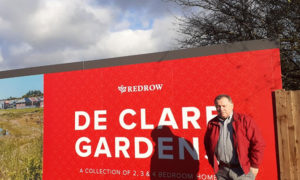 Plaid Cymru councillor Lindsay Whittle has attacked Redrow over its new development