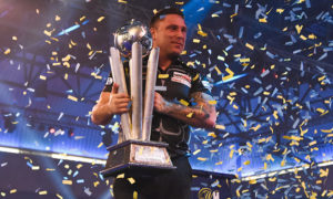 Gerwyn Price lifts the Sid Waddell Trophy after winning the PDC World Championships