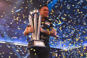 Gerwyn Price lifts the Sid Waddell Trophy after winning the PDC World Championships