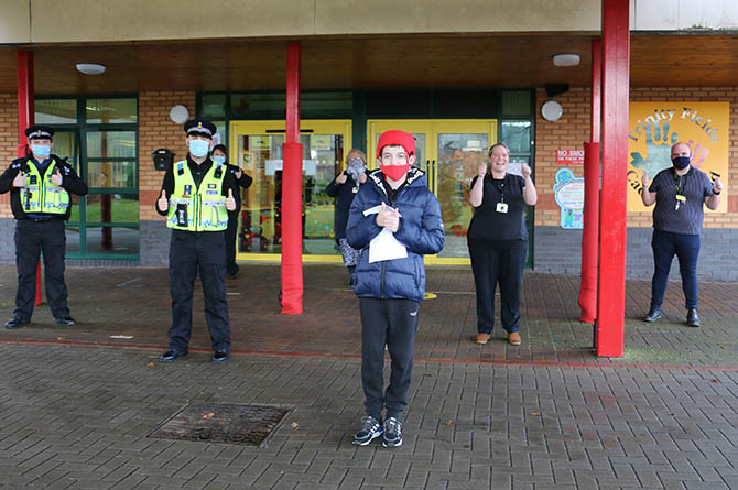 From left: PCSO Aidan Gillette; PCSO Thomas Bingham-Vick; Deputy NPAA for Gwent Sara Louise Evans; pupil Ross Sparey and teachers Sian Harris, Michelle Fritton and Gary Powell