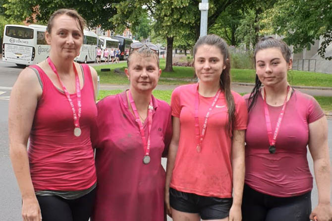 Kirsty Henderson, second left, after a Race for Life event to raise money for Cancer Research UK