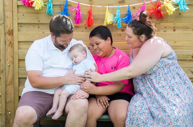 Oliver with father Nathan, brother Harley and mother Zara