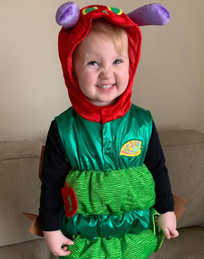 Inaya dressed as the Very Hungry Caterpillar for World Book Day