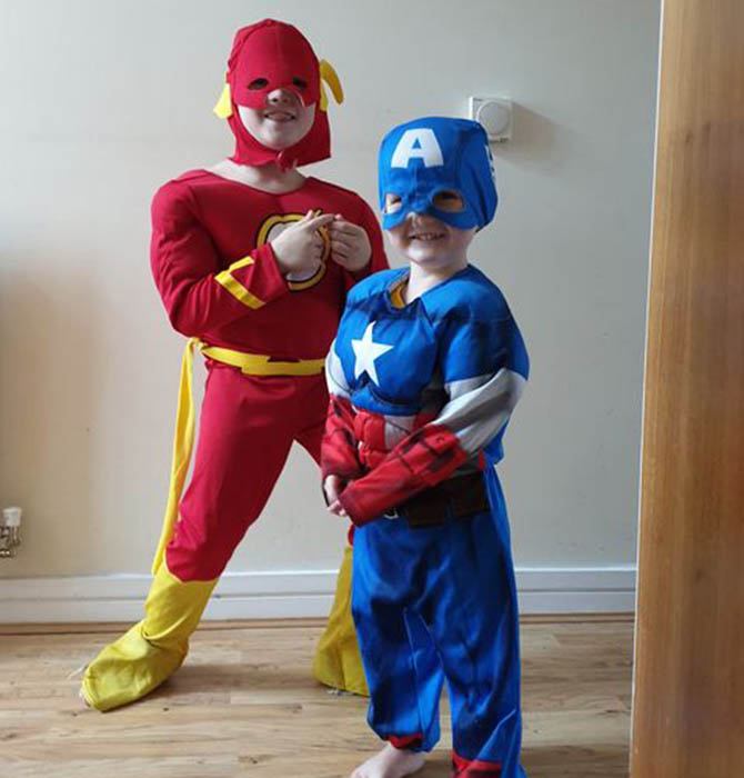 Jenson dressed as the Flash and Zachary dressed at Captain America