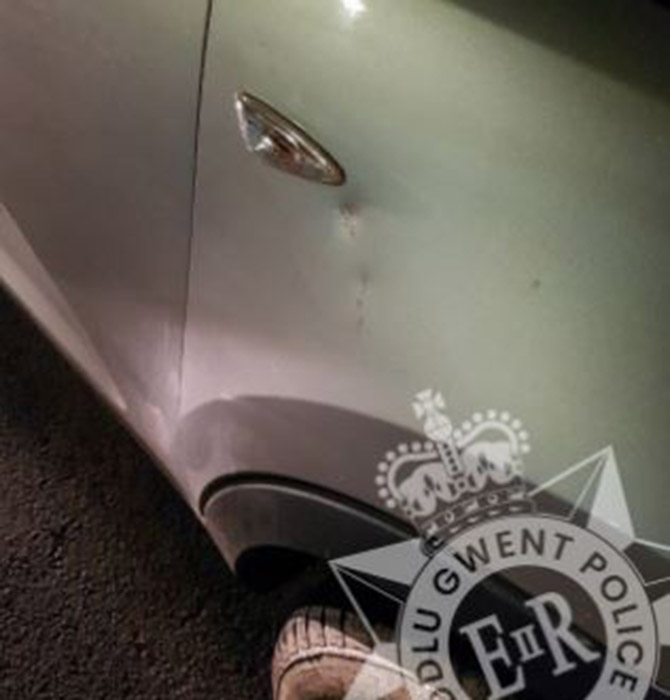 Damage caused to a car after it had stones thrown at it