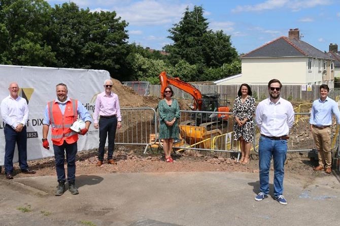 From left: Martin Bennett, Mal Richards and Andrew Dobbs of Willmott Dixon; Cllr Philippa Marsden; Cllr Lisa Phipps; William Jones of Willmott Dixon; Chris Boardman of Caerphilly County Borough Council outside the new development in Trecenydd