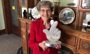 Katherine Hughes, secretary of Caerphilly Miners' Centre, with her National Lottery award