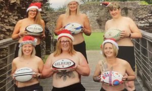 A group of women have posed for a topless calendar to raise money for the new breast care unit in Ystrad Mynach