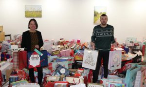 Council leader Philippa Marsden and Cabinet Member Shayne Cook with gifts donated to Operation Santa