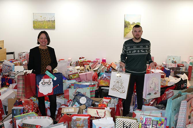 Council leader Philippa Marsden and Cabinet Member Shayne Cook with gifts donated to Operation Santa
