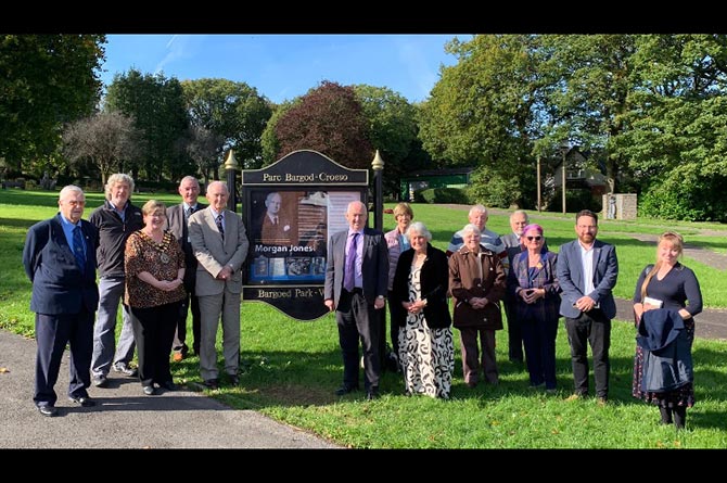 Members of Gelligaer Historical Society with local representatives at the Morgan Jones memorial plaque at Bargoed Park